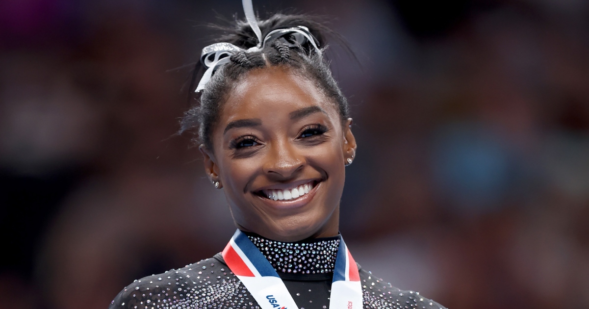 Simone Biles starved as child by addict mom, adopted by grandparents